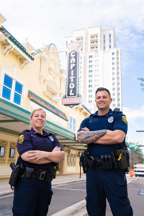 Officers in front of Capitol Theater