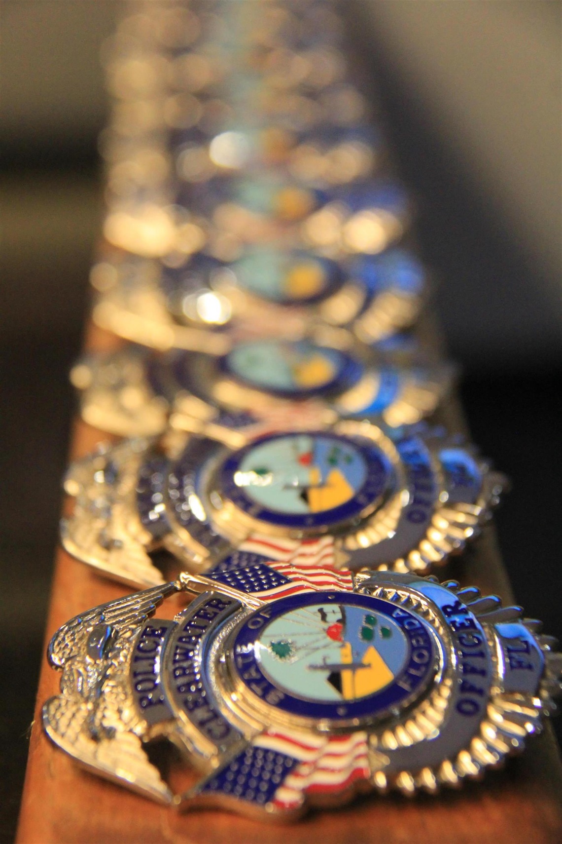 badges in a row on a podium